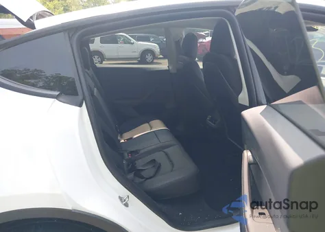 2023 Tesla Model Y from USA, damaged, VIN 7SAYGDEE1PF647564